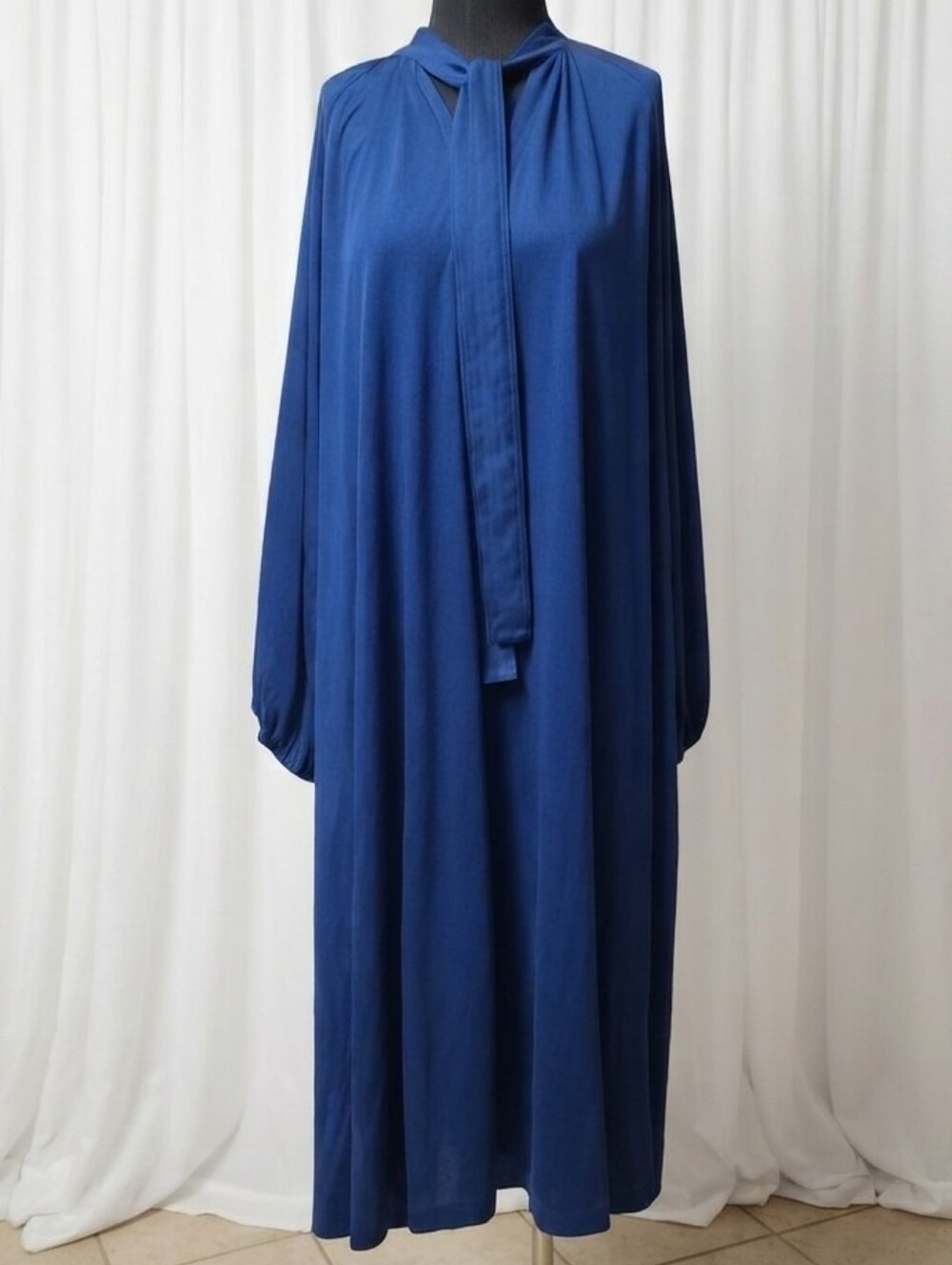 KristinIT navy blue tent dress features a modest, loose fit and a high neck with